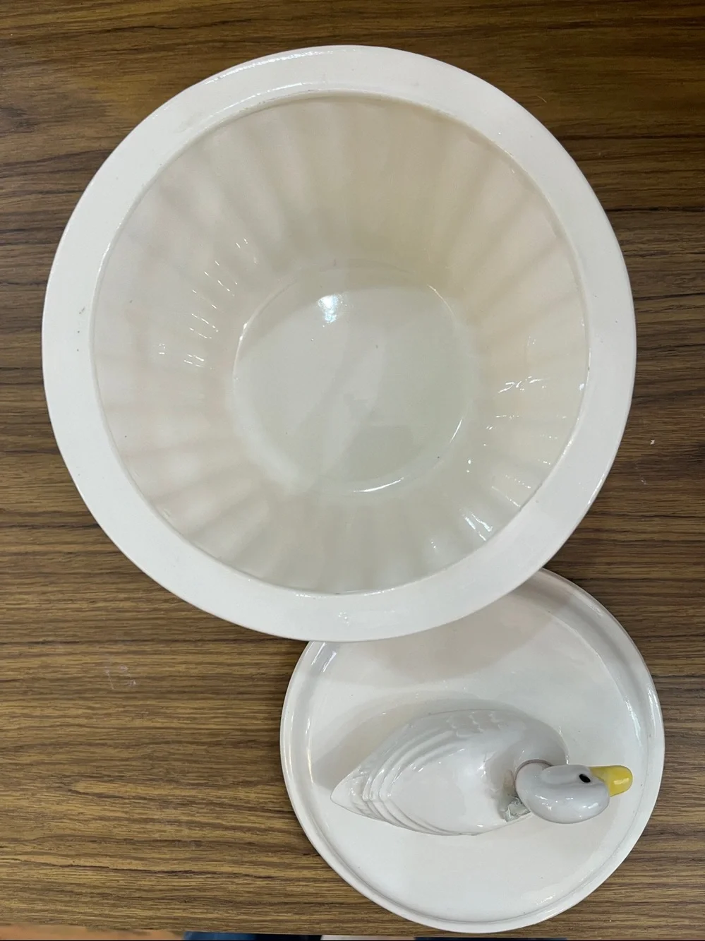 Vintage Hall Pottery Carbone white ceramic duck covered casserole dish.